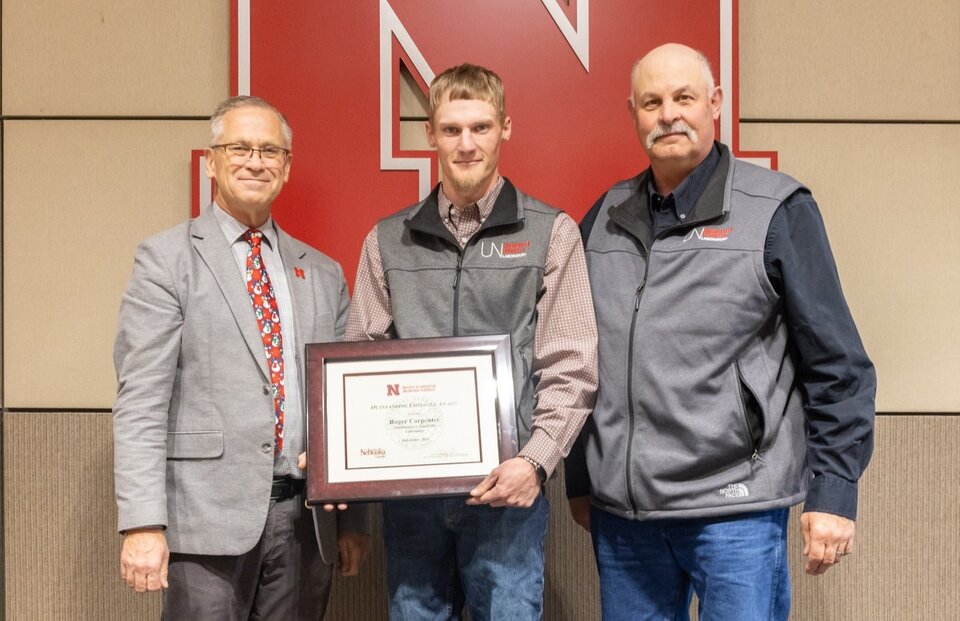 Roger Carpenter receives the Outstanding Employee Award. 